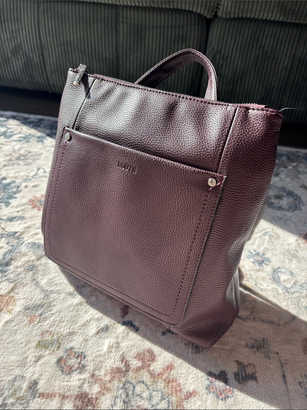 Roots Pebbled wine faux Leather Tote in Plum built in tablet sleeve